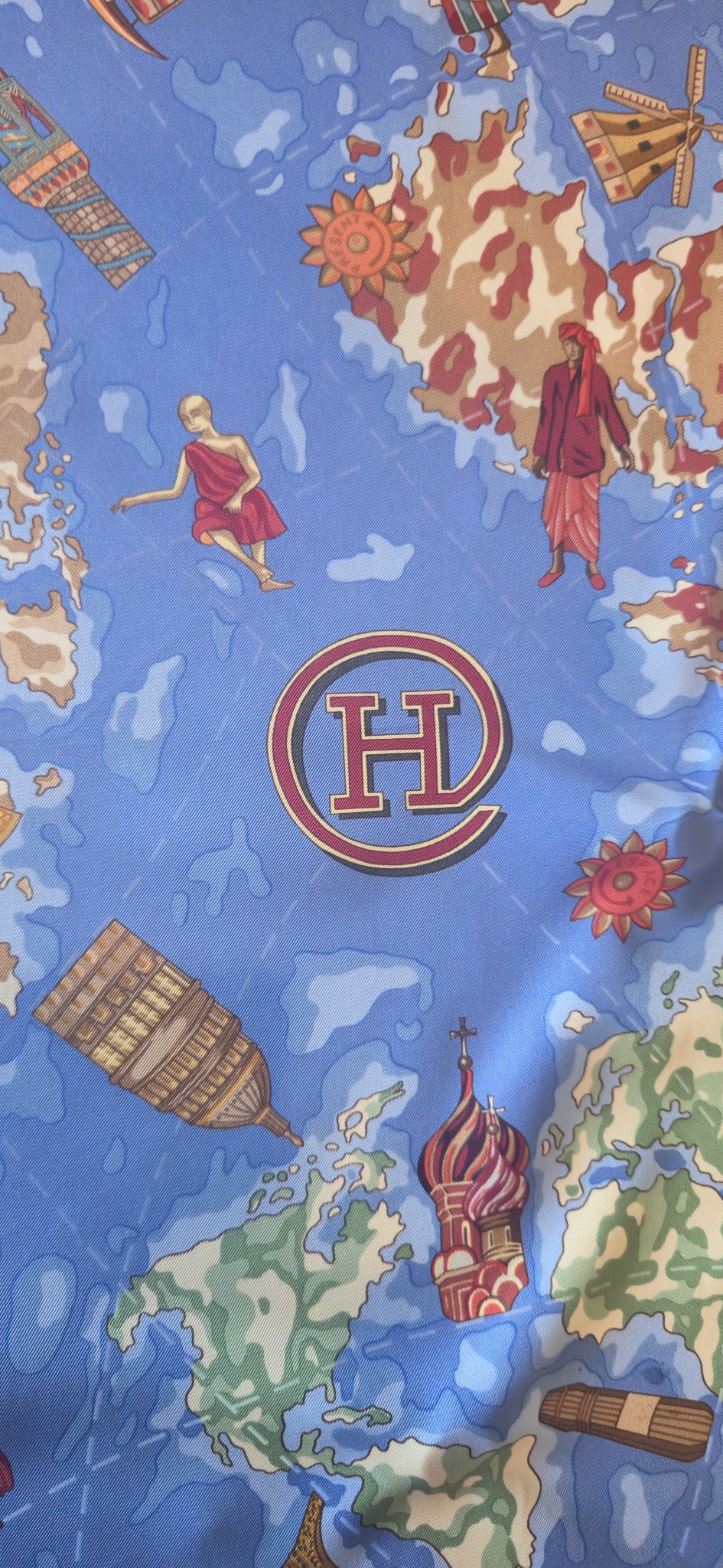 World map center with circled H