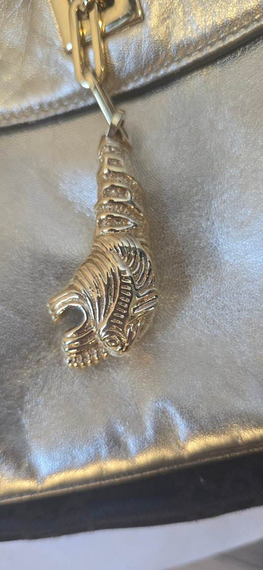 Gucci tiger head bag, front view on dust bag