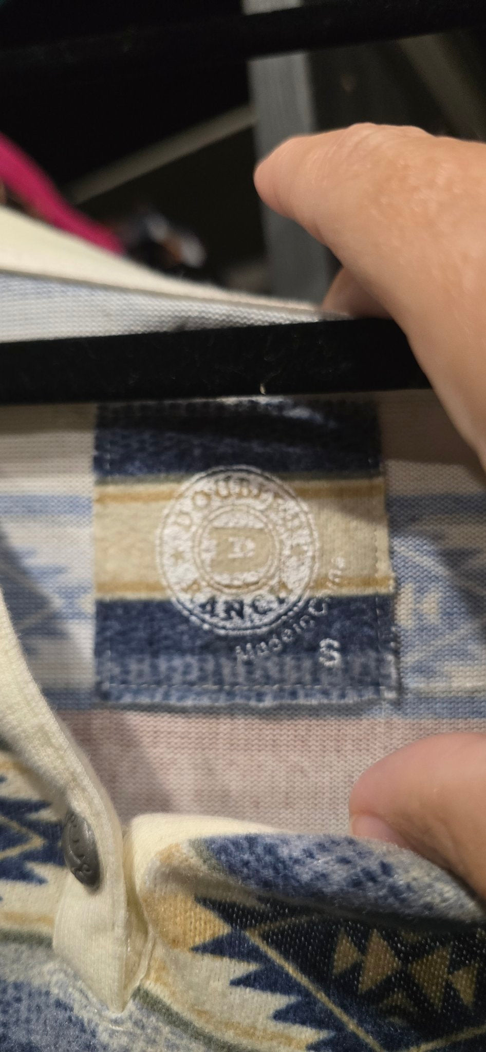 Close-up detail of the Double D Ranch Cow Camp Henley showing the southwestern knit pattern and henley buttons